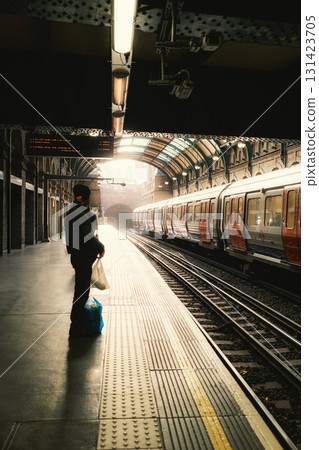 Man Waiting For A Train In London 131423705