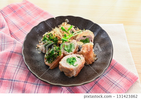 Bean sprouts wrapped in meat, served with grated daikon radish and ponzu sauce 131423862