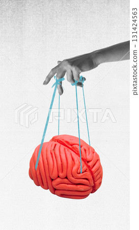 Trendy collage. Hand holding brain like puppet with strings on grey background Trendy collage. Hand holding brain like puppet with strings on grey background 131424563