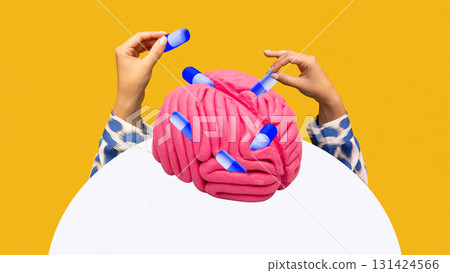 Graphic composition. Hands inserting capsules into pink brain symbolizing neuropharmacology 131424566