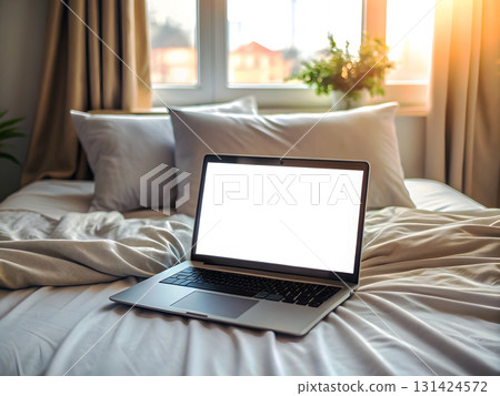 Cozy Laptop Workspace in Bright Bedroom 131424572