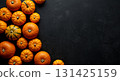 Fresh pumpkin on a dark background with copy space 131425159