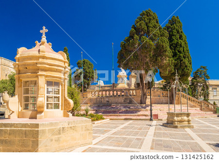 View of the St. Mary Magdalene Chapel square and the Statue of Saint Paul in the background, Rabat, Malta 131425162
