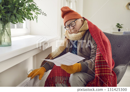 Senior Man Faces Winter Discomfort at Home Senior Man Faces Winter Discomfort at Home 131425300
