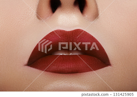 Beautiful Woman Lips with Fashion Bloody Red Lipstick Makeup. Beauty Surgery with fillers or Fashion Make-Up Concept. Passionate kiss on Valentines Day or bloody on Halloween. Female Sexy Open Mouth Beautiful Woman Lips with Fashion Bloody Red Lipstick Makeup. Beauty Surgery with fillers or Fashion Make-Up Concept. Passionate kiss on Valentines Day or bloody on Halloween. Female Sexy Open Mouth 131425905