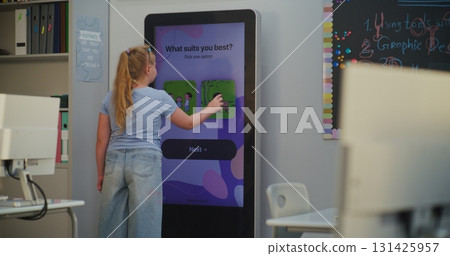 Young Schoolgirl on AI Mood Tracker Takes Test to Determine Personality Type Young Schoolgirl on AI Mood Tracker Takes Test to Determine Personality Type 131425957