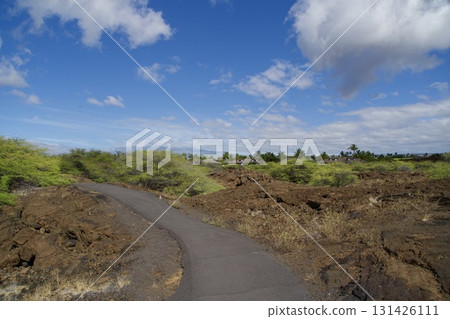 Landscape of a road on lava and blue sky in Hawaii Landscape of a road on lava and blue sky in Hawaii 131426111