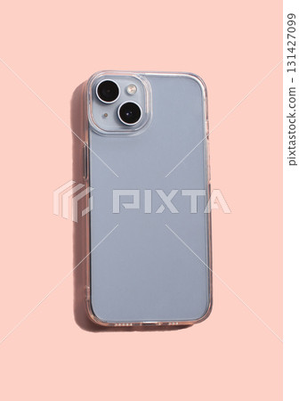Phone with new smartphone transparent case on pink background Phone with new smartphone transparent case on pink background 131427099