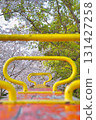 Cherry blossoms, trees and seesaw 131427258