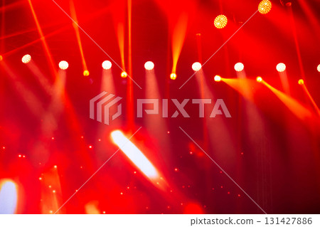 Stage white and red light beams on dark background. Stage lighting for concert. 131427886