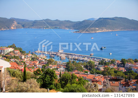 Beautiful coastal town with small white houses taken from above. Houses by the sea. Beautiful coastal town with small white houses taken from above. Houses by the sea. 131427893