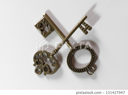 Vintage keys arranged on a flat surface Vintage keys arranged on a flat surface 131427947
