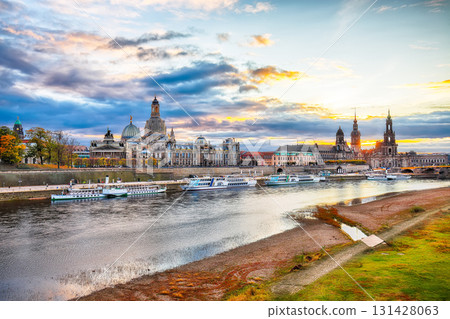 Amazing Sunset in Dresden on Elbe river with Cathedral of the Holy Trinity and Bruehl's Terrace. Amazing Sunset in Dresden on Elbe river with Cathedral of the Holy Trinity and Bruehl's Terrace. 131428063