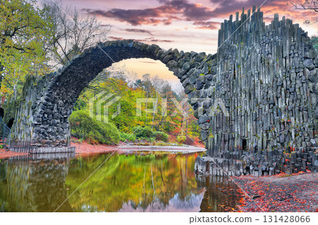 Breathtaking autumn landscape in Kromlau Rhododendron Park . Rakotz Bridge (Rakotzbrucke, Devil's Bridge) Breathtaking autumn landscape in Kromlau Rhododendron Park . Rakotz Bridge (Rakotzbrucke, Devil's Bridge) 131428066
