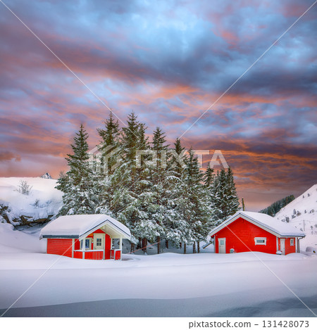 Amazing winter scenery with traditional Norwegian red wooden houses on the shore of Rolvsfjord. Amazing winter scenery with traditional Norwegian red wooden houses on the shore of Rolvsfjord. 131428073