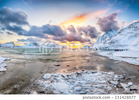Amazing winter scenery with Haukland beach during sunset and snowy  mountain peaks near Leknes. 131428077
