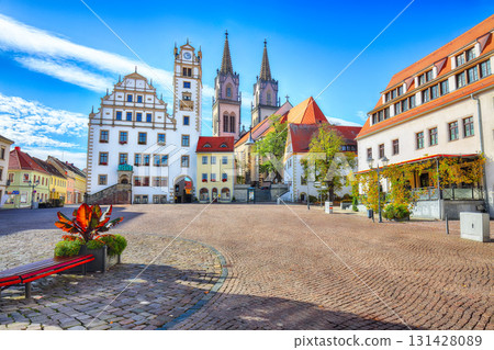 Amazing autumn cityscape of Oschatz central square with Stadtverwaltung and St. Aegidien church. 131428089