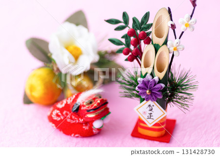 New Year's pine decoration on a pink background 131428730