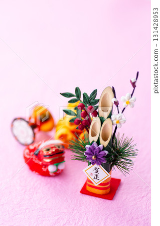 New Year's pine decoration on a pink background 131428953