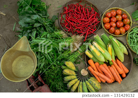 Explore Fresh and Vibrant Vegetables as well as Aromatic Herbs Available at the Local Market 131429132