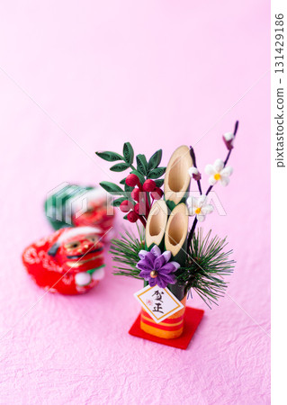 New Year's pine decoration on a pink background New Year's pine decoration on a pink background 131429186