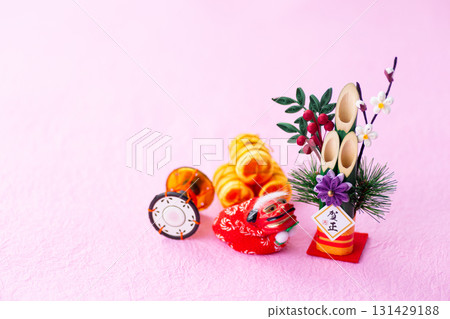 New Year's pine decoration on a pink background New Year's pine decoration on a pink background 131429188