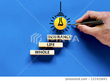 Whole life insurance symbol. Concept words Whole life insurance on beautiful wooden blocks. Beautiful blue table blue background. Businessman hand. Business whole life insurance concept. Copy space. 131429841