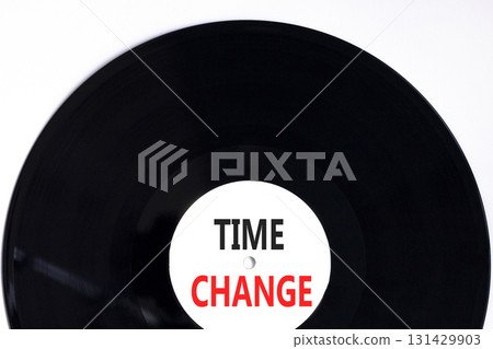 Time change symbol. Concept word Time change on beautiful black and white vinyl disk. Beautiful white paper background. Business time change concept. Copy space. 131429903