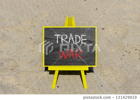 Trade war symbol. Concept word Trade war on beautiful black blackboard. Beautiful sand beach background. Black blackboard. Business trade war concept. Copy space. Trade war symbol. Concept word Trade war on beautiful black blackboard. Beautiful sand beach background. Black blackboard. Business trade war concept. Copy space. 131429919