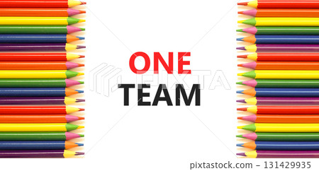 One team symbol. Concept word One team on beautiful white paper. Colored pencils. Beautiful white paper background. Business one team concept. Copy space. 131429935