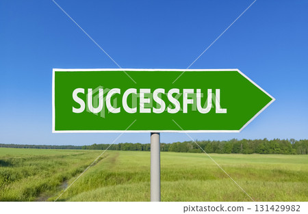 Successful symbol. Concept word Successful on beautiful green road sign. Beautiful blue sky green grass and forest peaceful nature background. Business successful concept. Copy space. Successful symbol. Concept word Successful on beautiful green road sign. Beautiful blue sky green grass and forest peaceful nature background. Business successful concept. Copy space. 131429982