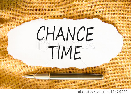 Chance time symbol. Concept word Chance time on beautiful white paper. Beautiful canvas background. Black pen. Business chance time concept. Copy space. Chance time symbol. Concept word Chance time on beautiful white paper. Beautiful canvas background. Black pen. Business chance time concept. Copy space. 131429991