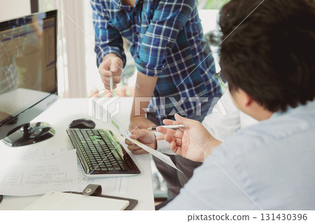 Programmers team working in a software developing. Developing programming and coding technologies. Website design. Cyber space concept. Programmers team working in a software developing. Developing programming and coding technologies. Website design. Cyber space concept. 131430396