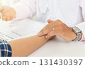 Doctor examining patient pulse by hands. Healthcare and medical service. 131430397