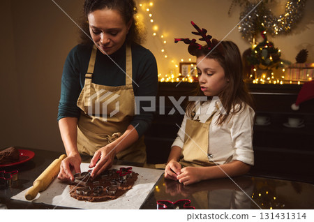 Mother And Daughter Bake Gingerbread Cookies For Christmas In Cozy Home Kitchen Mother And Daughter Bake Gingerbread Cookies For Christmas In Cozy Home Kitchen 131431314