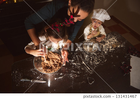 Joyful Mom Bakes Gingerbread With Kids During Christmas At Home Joyful Mom Bakes Gingerbread With Kids During Christmas At Home 131431467