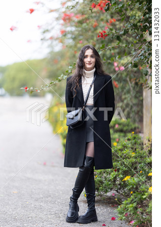 Young woman posing in stylish winter fashion outfit Young woman posing in stylish winter fashion outfit 131432033