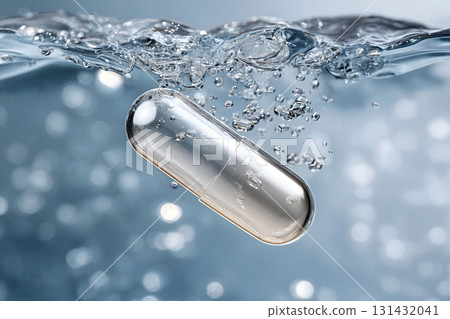Clear Capsule Splashing into Water 131432041