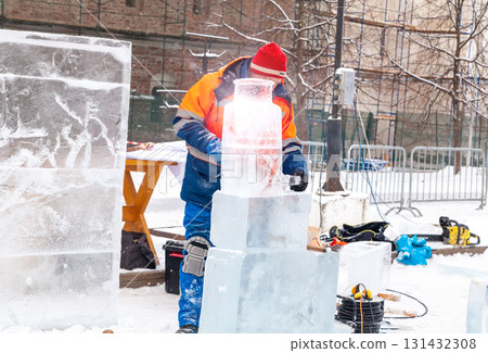 Vologda, Russia - February 15, 2025. Ice sculpture creation on the city's central square Vologda, Russia - February 15, 2025. Ice sculpture creation on the city's central square 131432308