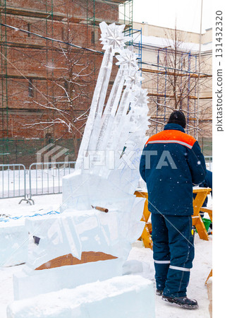 Vologda, Russia - February 15, 2025. Ice sculpture creation on the city's central square Vologda, Russia - February 15, 2025. Ice sculpture creation on the city's central square 131432320