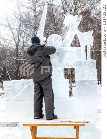Vologda, Russia - February 15, 2025. Ice sculpture creation on the city's central square 131432323