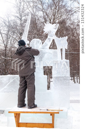 Vologda, Russia - February 15, 2025. Ice sculpture creation on the city's central square Vologda, Russia - February 15, 2025. Ice sculpture creation on the city's central square 131432324