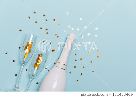 New Year 2026 Celebration with Champagne and Gold Decorations New Year 2026 Celebration with Champagne and Gold Decorations 131433409