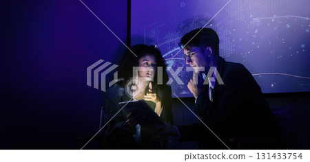 Business team discussing and using technology artificial intelligence with digital Ai assistant. Futuristic innovation AI technology collaboration and ideas for future. Business Tech Startup meeting. Business team discussing and using technology artificial intelligence with digital Ai assistant. Futuristic innovation AI technology collaboration and ideas for future. Business Tech Startup meeting. 131433754