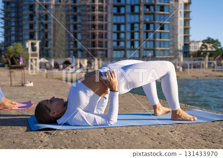 Yoga Bridge Pose Beach Workout Fitness 131433970
