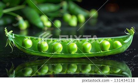 Peas on a reflective surface minimalist black background 131434118