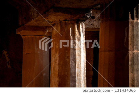 Ancient stone columns standing in Tombs of the Kings. Paphos, Cyprus Ancient stone columns standing in Tombs of the Kings. Paphos, Cyprus 131434366