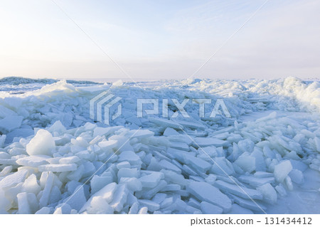 Ice ridges on the frozen Baltic Sea. Blue white landscape 131434412