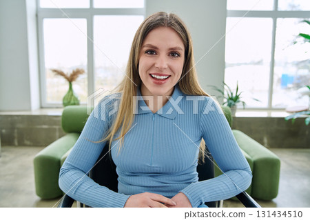 Web cam view of young woman talking looking in camera, online meeting, video call 131434510