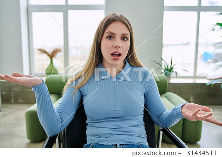Web cam view of young woman talking looking in camera, online meeting, video call 131434511